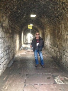 Our guide, Sedar, in treatment tunnel.