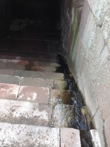 Spring water flowing into treatment tunnel.