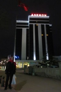 me in front of our hotel with Turkish flag