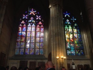 Two styles of stain glass side by side