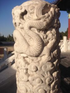 detail of dragon and cloud column